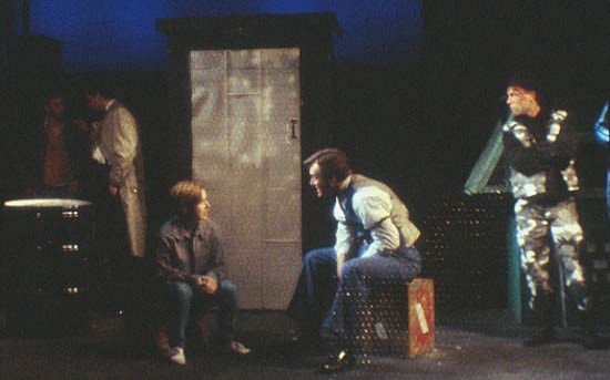 Kristen Lee Kelly as Delphie listens to the stories of
					Dillinger, played by Brent Black.