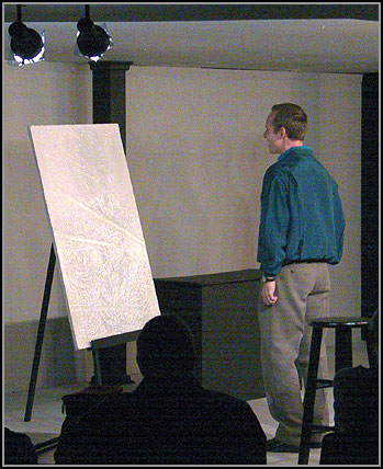 Marc (Craig Bentley) considers Serge's painting for the first time.