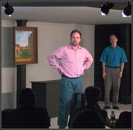 Marc (Craig Bentley) derides any value Yvan (Matthew Lawler) feels for Serge's painting.