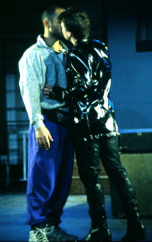 Crotch (Kevin Henderson) plants a kiss on Freddie (Clark Jackson).