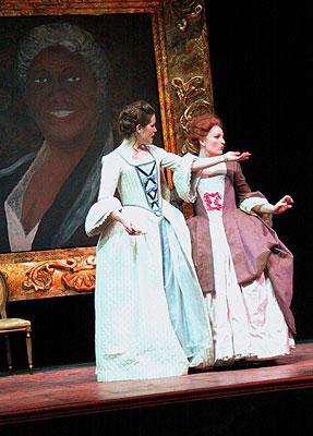 Giacinta insults Vittoria by ignoring her third kiss of three and asking her to sit down instead.