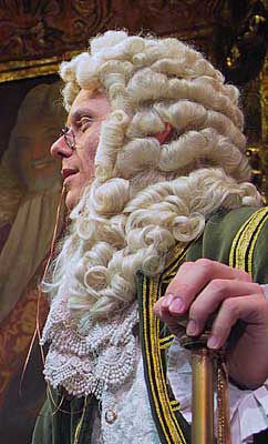 Fulgenzio listens, with grave concern, as Leonardo spills the beans about his love for Giacinta.