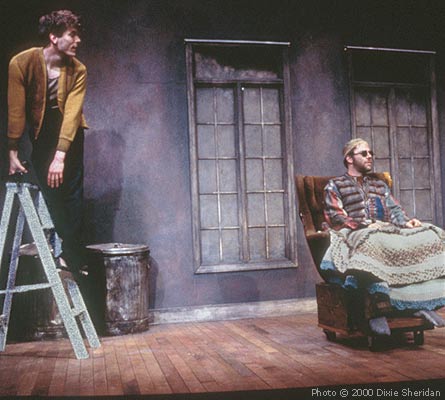 Clov (David Fitzgerald) informs Hamm (Matthew Lawler) that outside, all is GRAY.