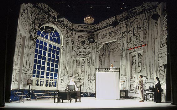 Professor Ridolfi (Obi Ndefo) and Elisa 
							(Amy Cronise) are greeted at the Vatican 
							by a Pope dummy behind a curtain in the Pope's chambers.