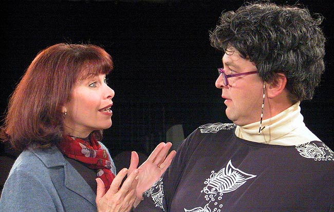 Kate (Betsy Jessie) confronts her therapist Leslie (John Alexander) with her husband's obsession with his dog.